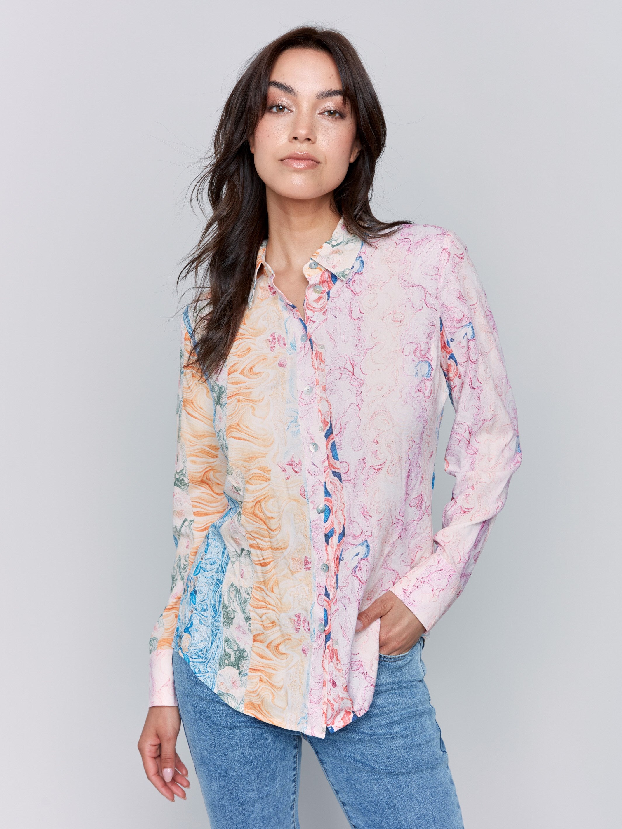 Shirt collar design blouse with vibrant abstract pattern by Charlie B.