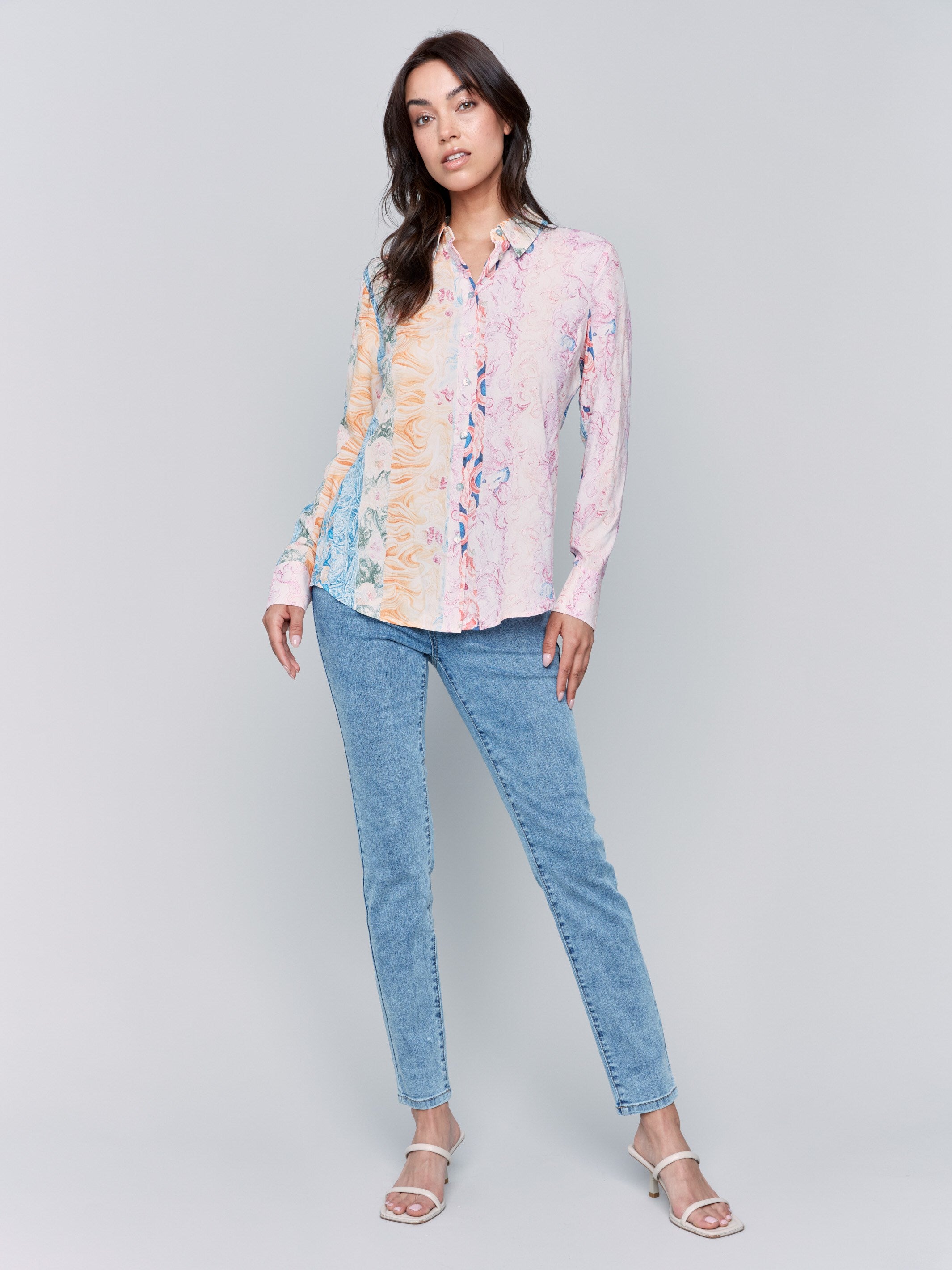 Long sleeve blouse featuring a striking abstract design by Charlie B.