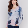 Light grey V-neck sweater with an abstract print and drop shoulders by Charlie B.