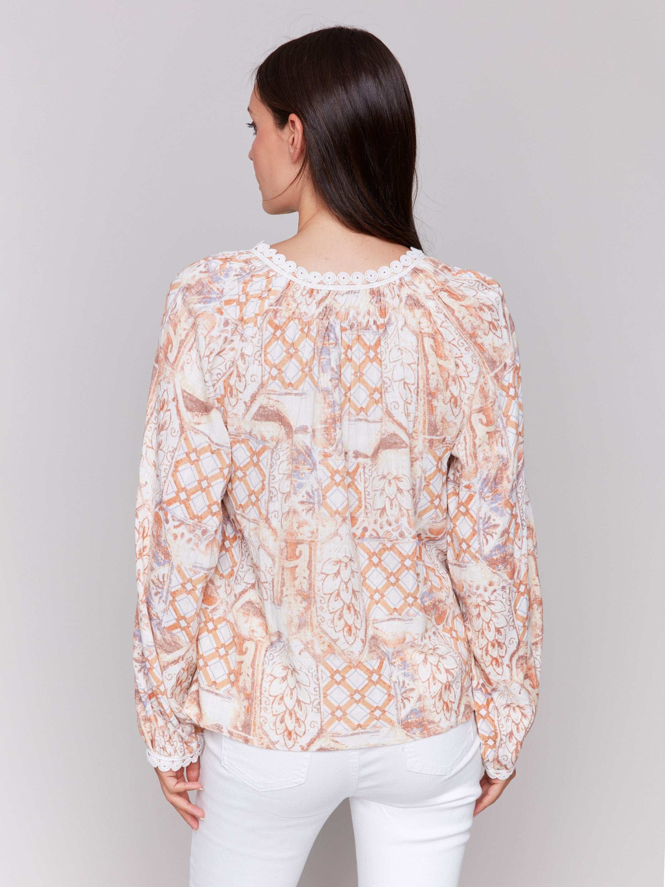 Geometric floral print blouse with stylish V-notch neckline by Charlie B.