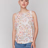 Top with crew neckline and vibrant floral design by Charlie B.