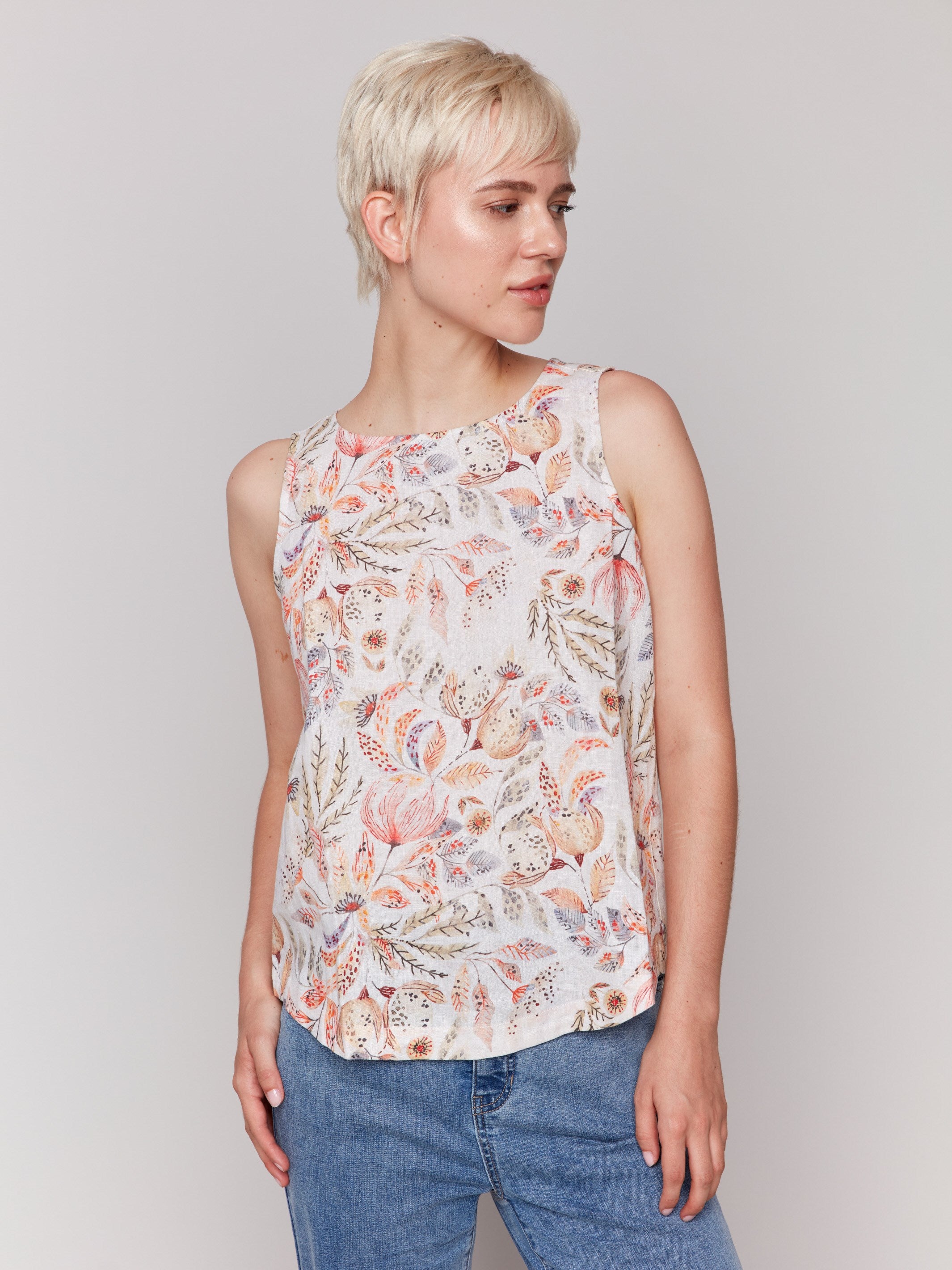 Tropical print top with elegant sleeveless cut by Charlie B.