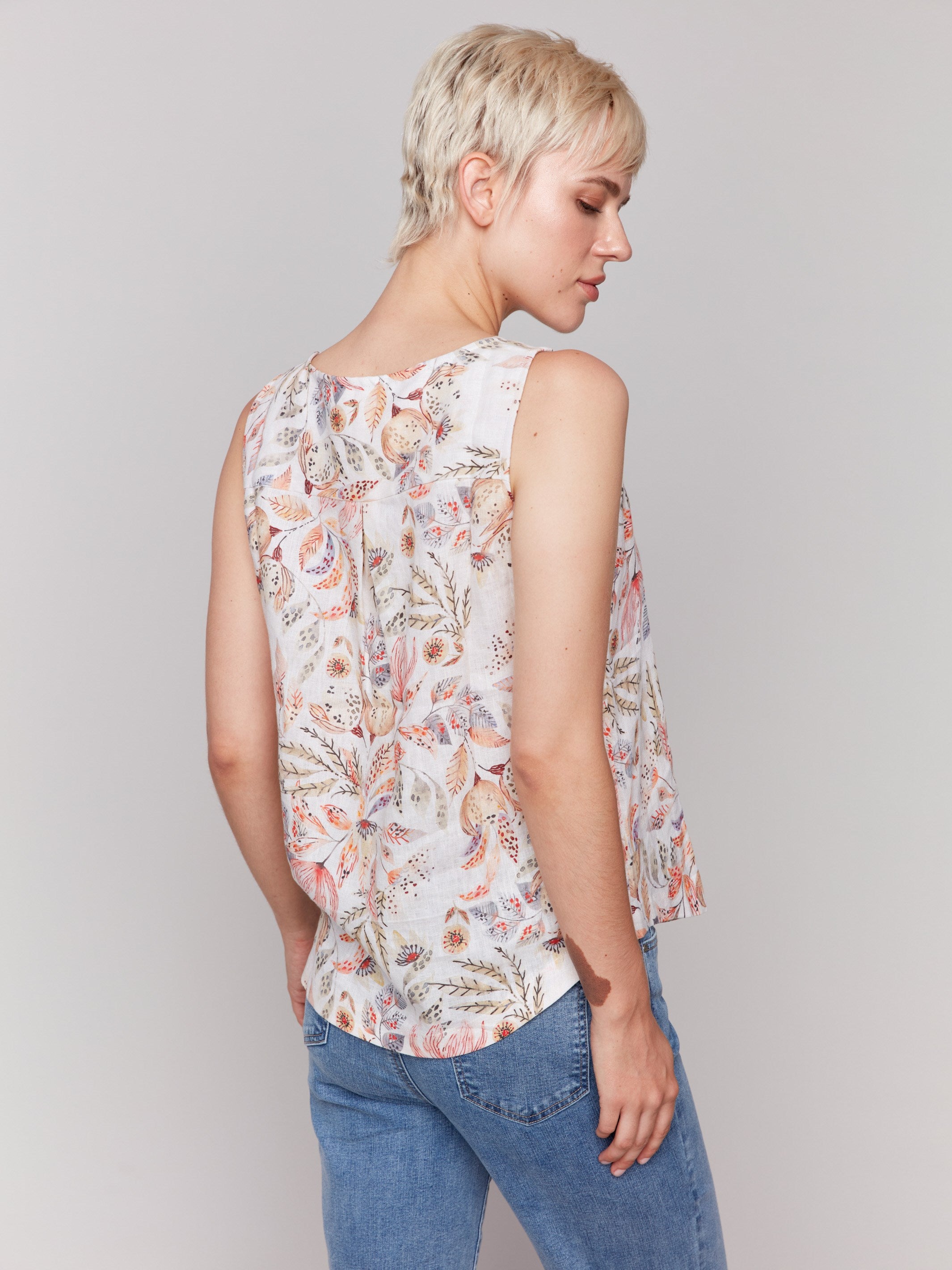 Vibrant floral top showcasing a stylish crew neckline by Charlie B.