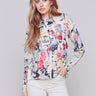 Multi-colored cartoon printed sweater with long sleeves, crew neck, and side button details by Charlie B.