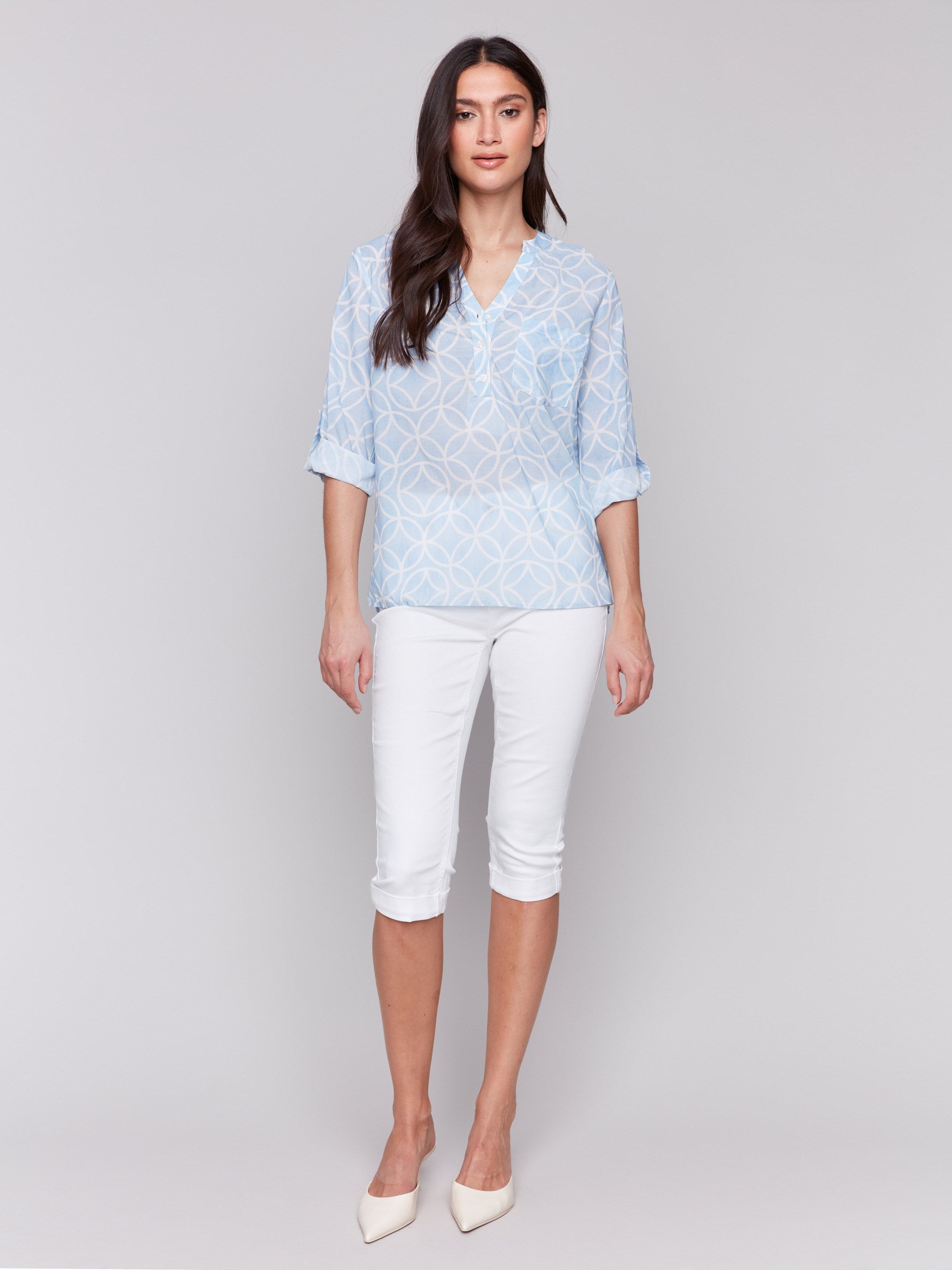 Bluebell blouse featuring adjustable roll-up sleeves with a geometric design by Charlie B.