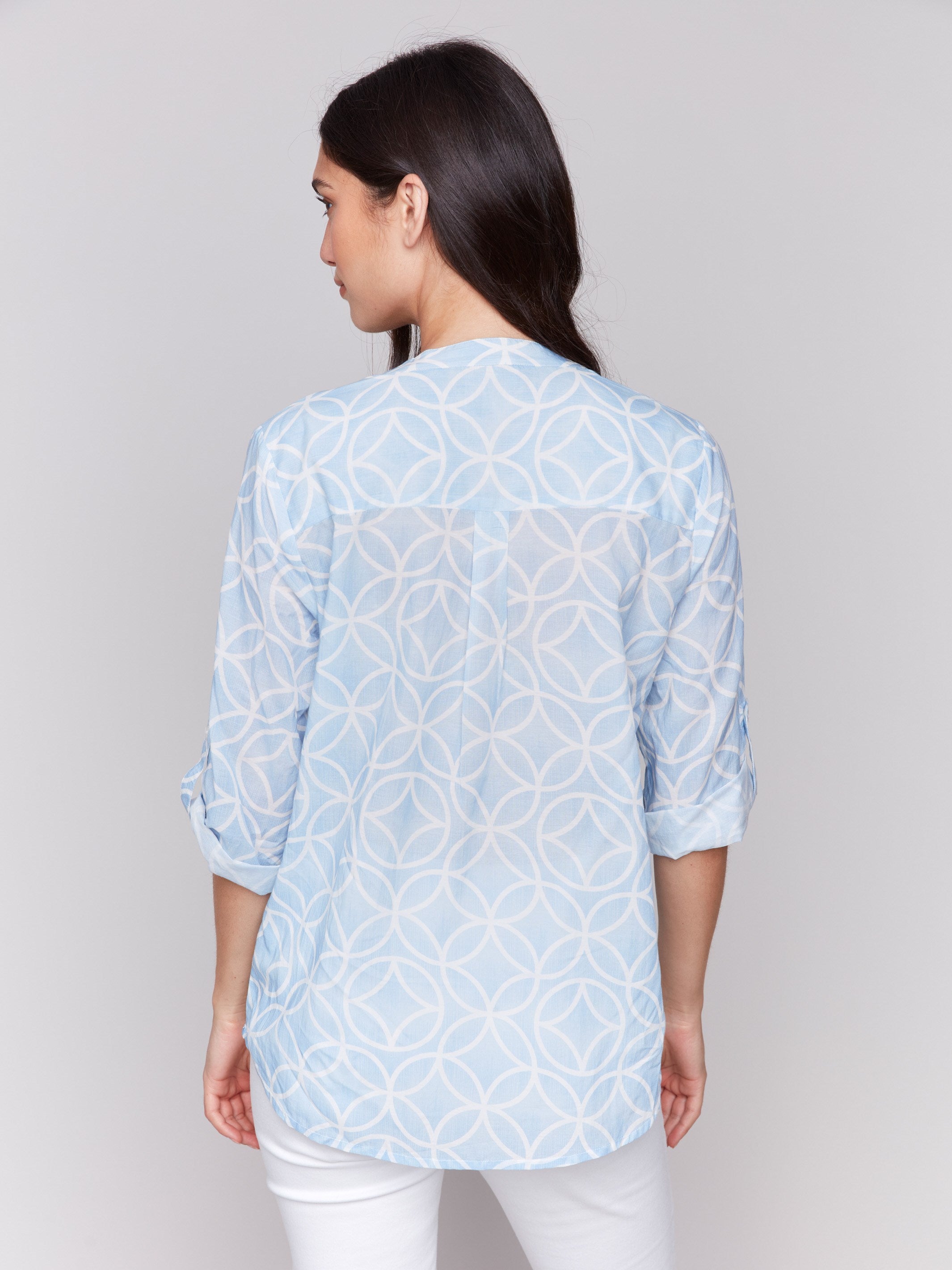 Half-button bluebell blouse with a stylish chest pocket and geometric print by Charlie B.