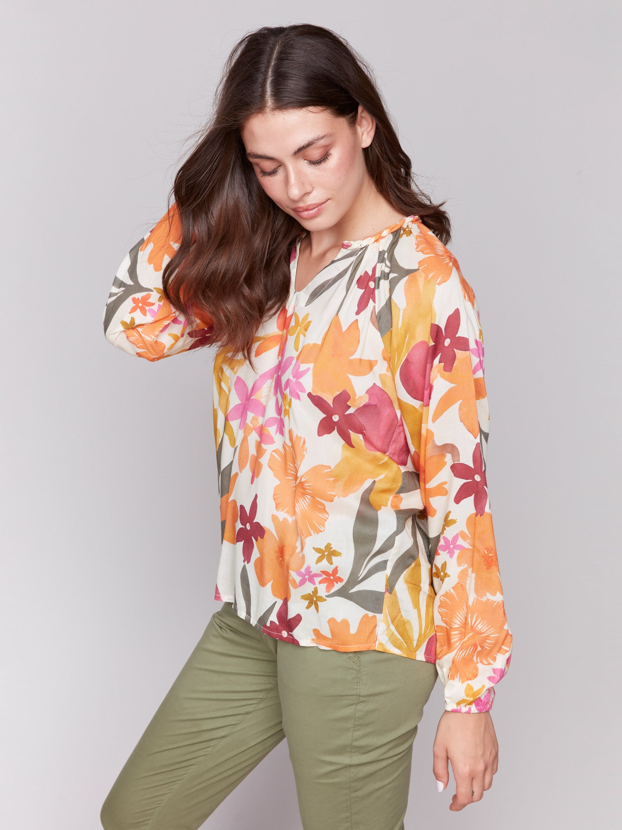 Raglan sleeves enhance the floral popover blouse by Charlie B.