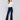 Blue Pull-On Flare Jeans with front buttons and two back patch pockets by Charlie B.