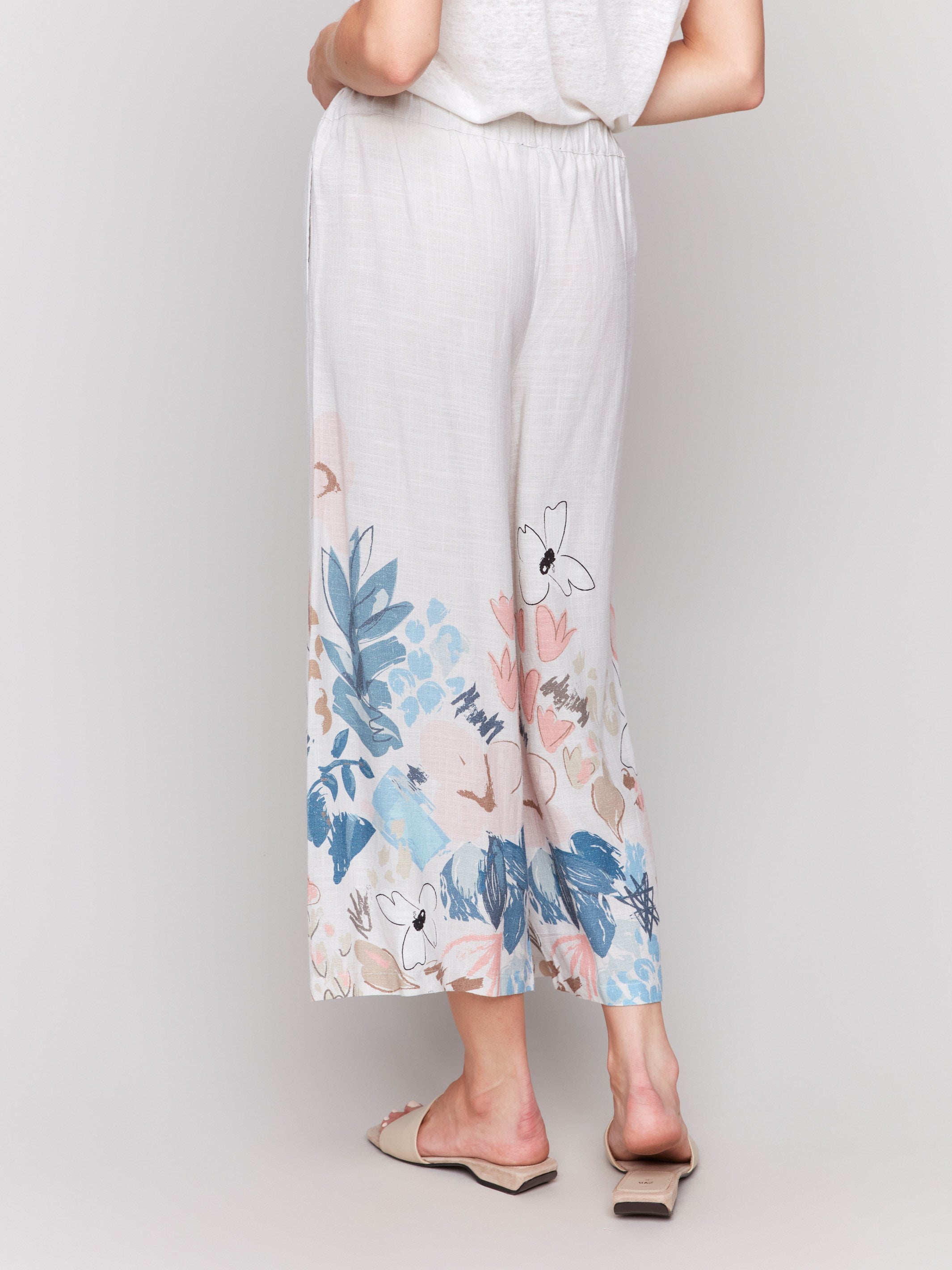 Floral patterned cropped pants with a comfortable drawstring waist by Charlie B.