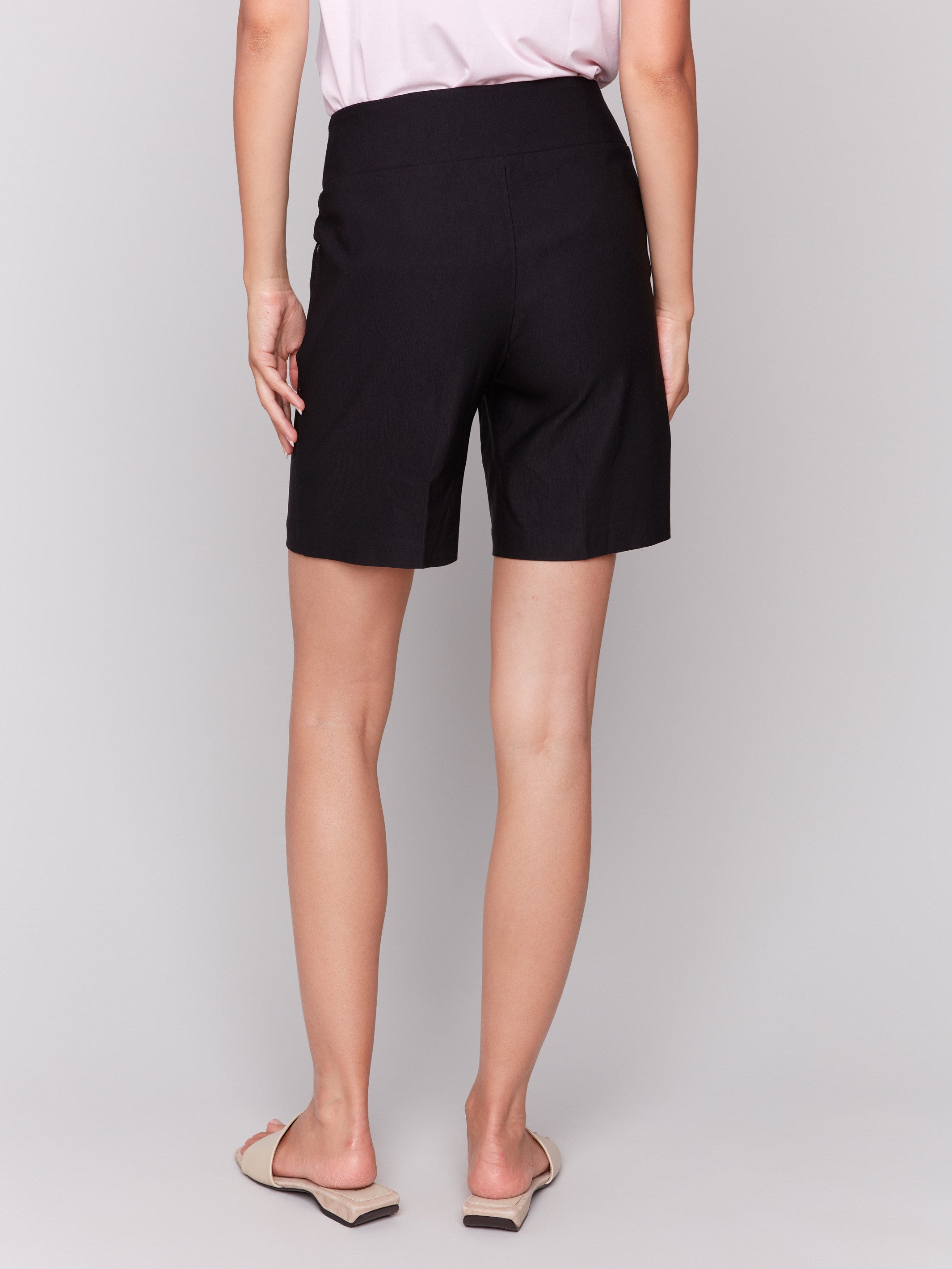 Stylish black shorts with two handy slash pockets by Charlie B.