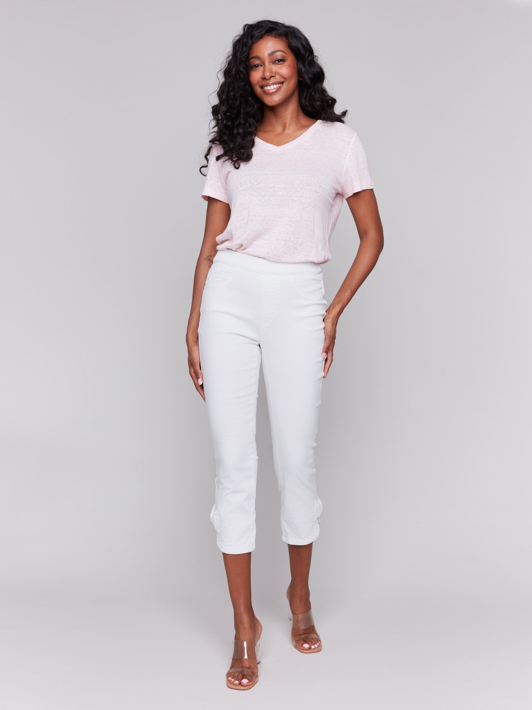 White twill pants featuring a slim leg design, ideal for versatile styling by Charlie B.