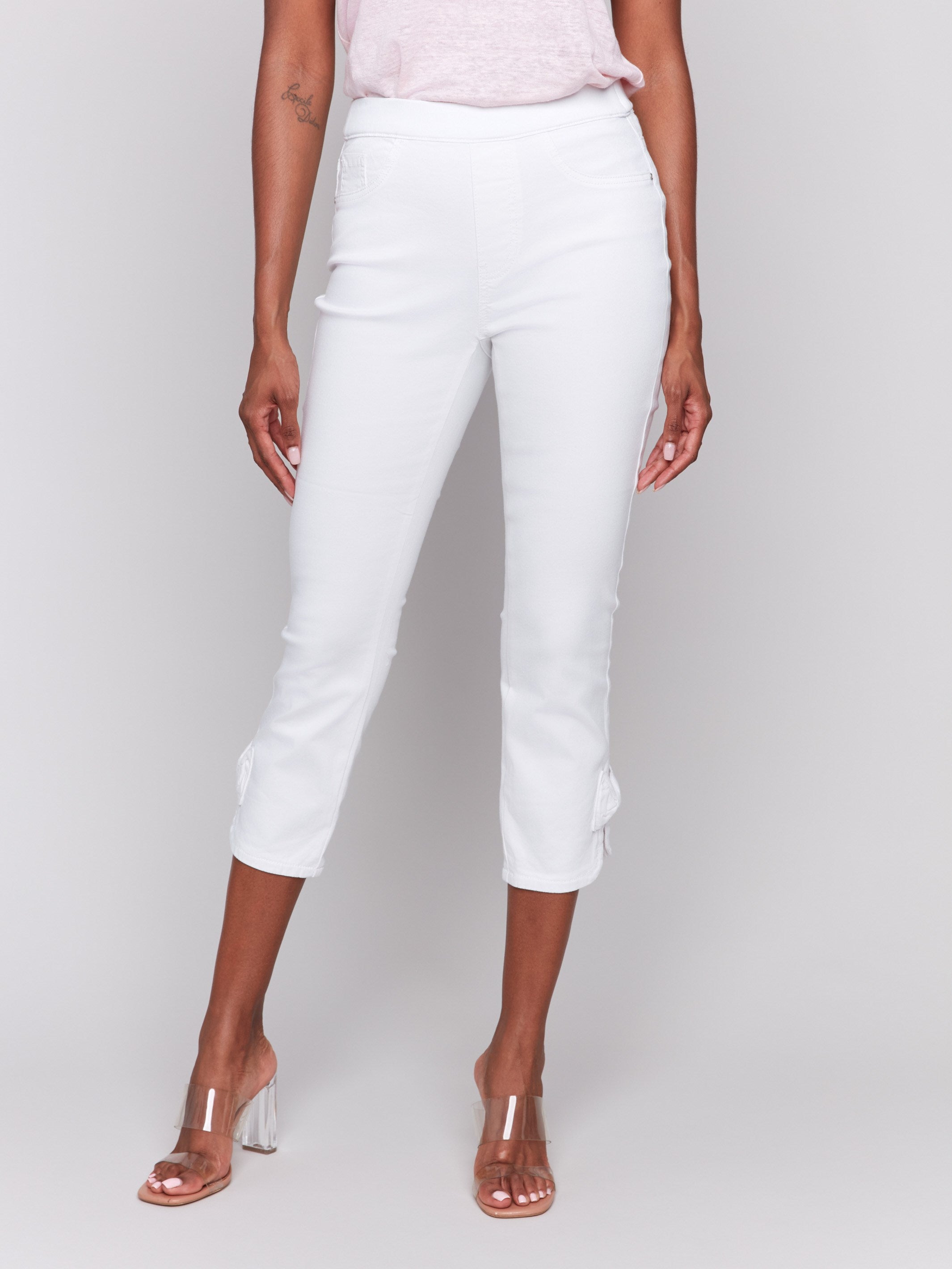 Cropped length white pants crafted from stretch twill fabric for comfort by Charlie B.