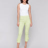 Light green pants featuring a slim leg design, ideal for versatile styling by Charlie B.