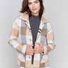 Reversible plaid jacket in quartz pink with button front and patch pockets by Charlie B. Demonstrated in a plaid pattern on each side, in shades of Quartz.