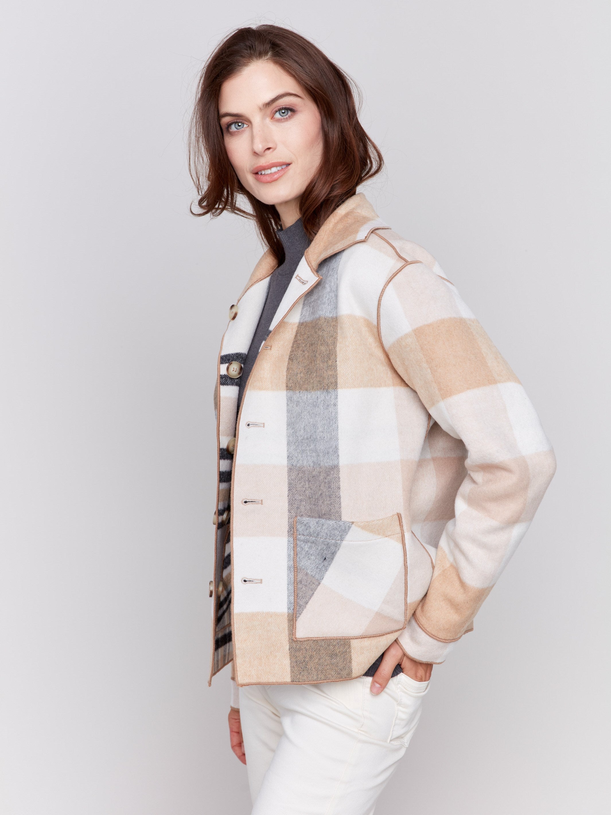 Reversible plaid jacket in quartz pink with button front and patch pockets by Charlie B. Demonstrated in a plaid pattern on each side, in shades of Quartz.