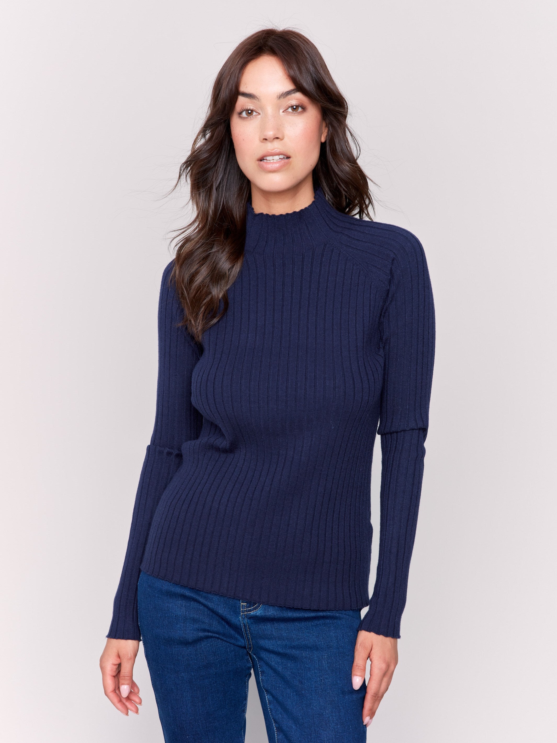 Navy ribbed knit sweater with a mock neck and long sleeves by Charlie B.