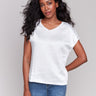 Natural satin V-neck top with dolman sleeves by Charlie B.