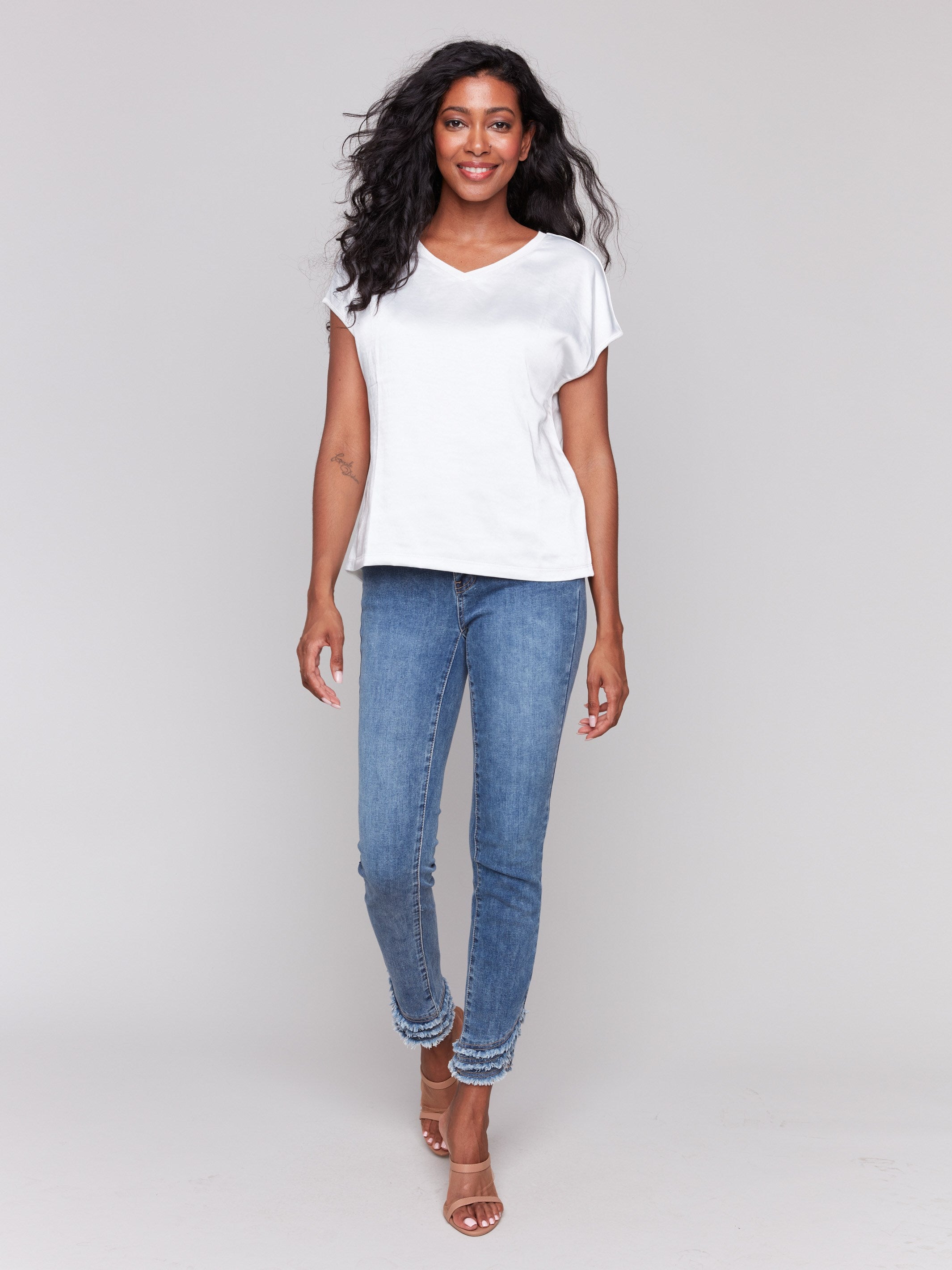 Natural satin V-neck top with dolman sleeves by Charlie B.