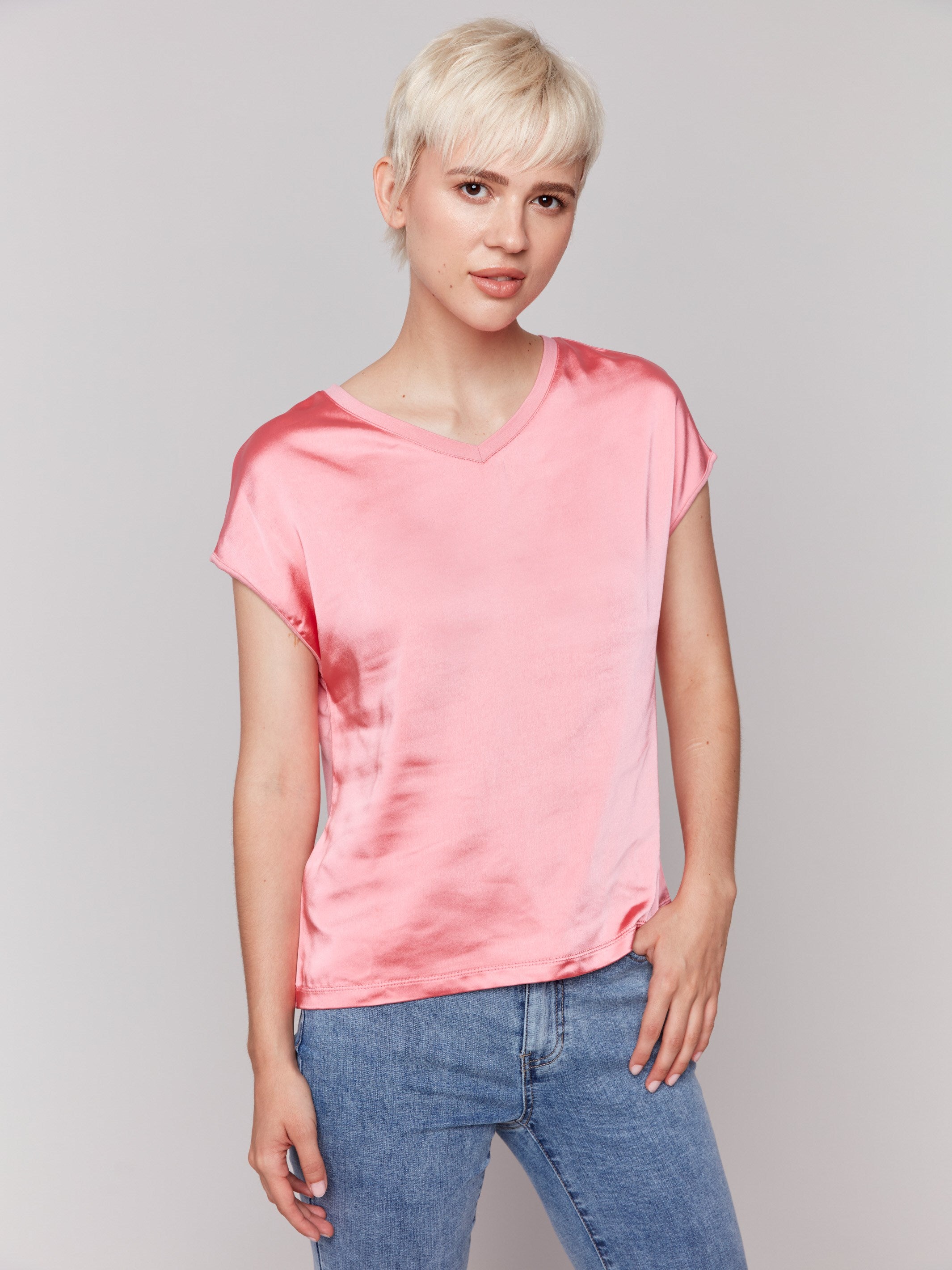 Pink satin V-neck top with dolman sleeves by Charlie B.