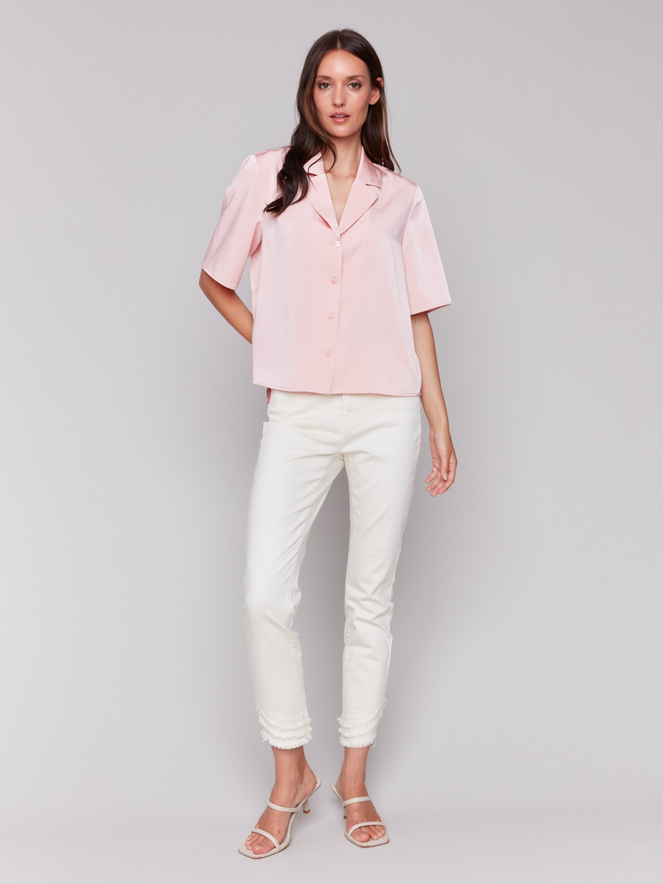 Satin button-up in guava featuring elegant short sleeves by Charlie B.