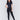 Black skinny twill pants with a mid-rise waist, skinny fit, and front zipper pocket detail by Charlie B.