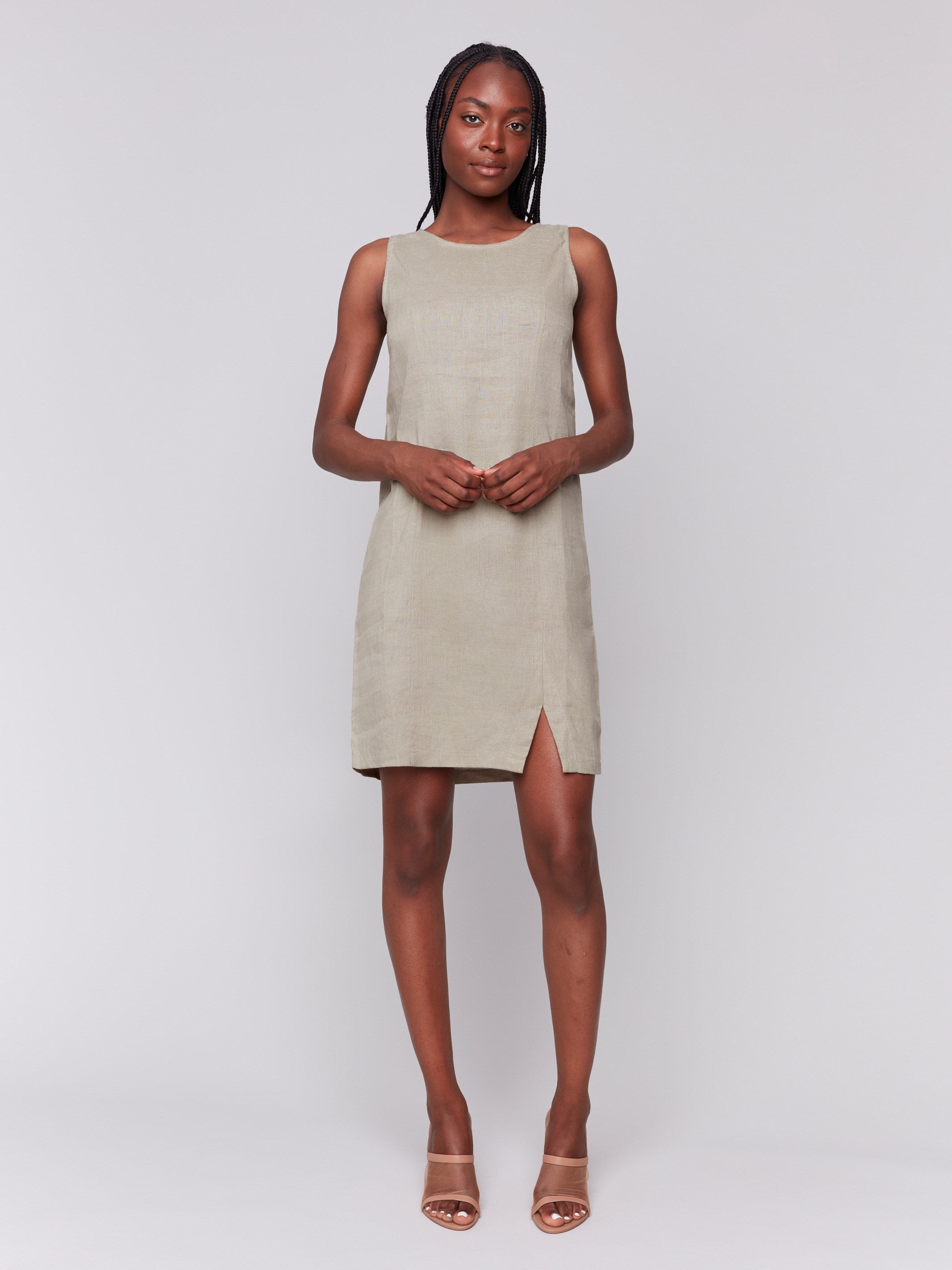 Chic dress with a unique front slit detail by Charlie B.