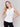 White sleeveless super stretch top with a crew neckline by Charlie B.