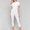 White slim cropped pants with a five-pocket design by Charlie B.