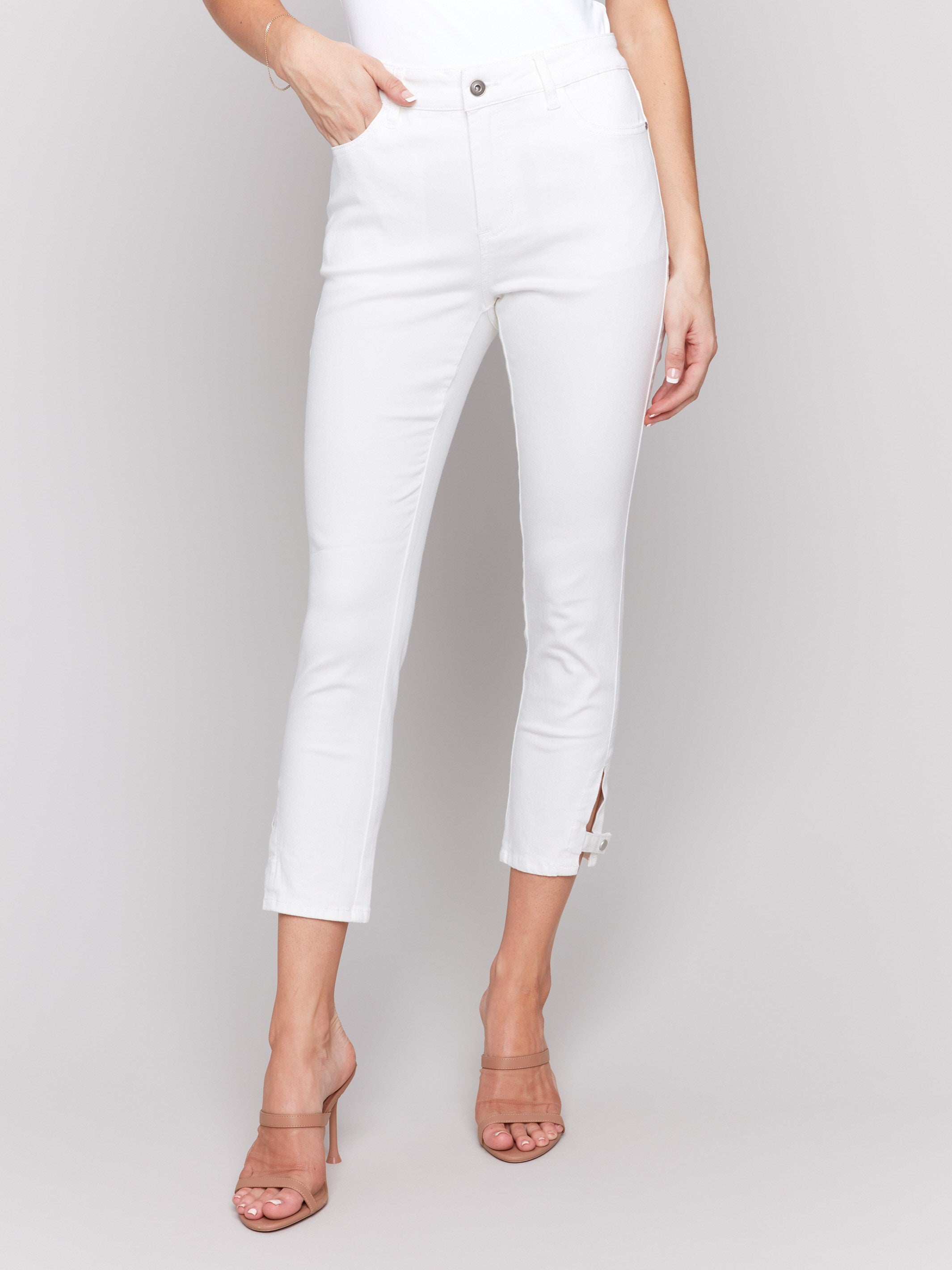 White slim cropped pants featuring stretch twill fabric by Charlie B.