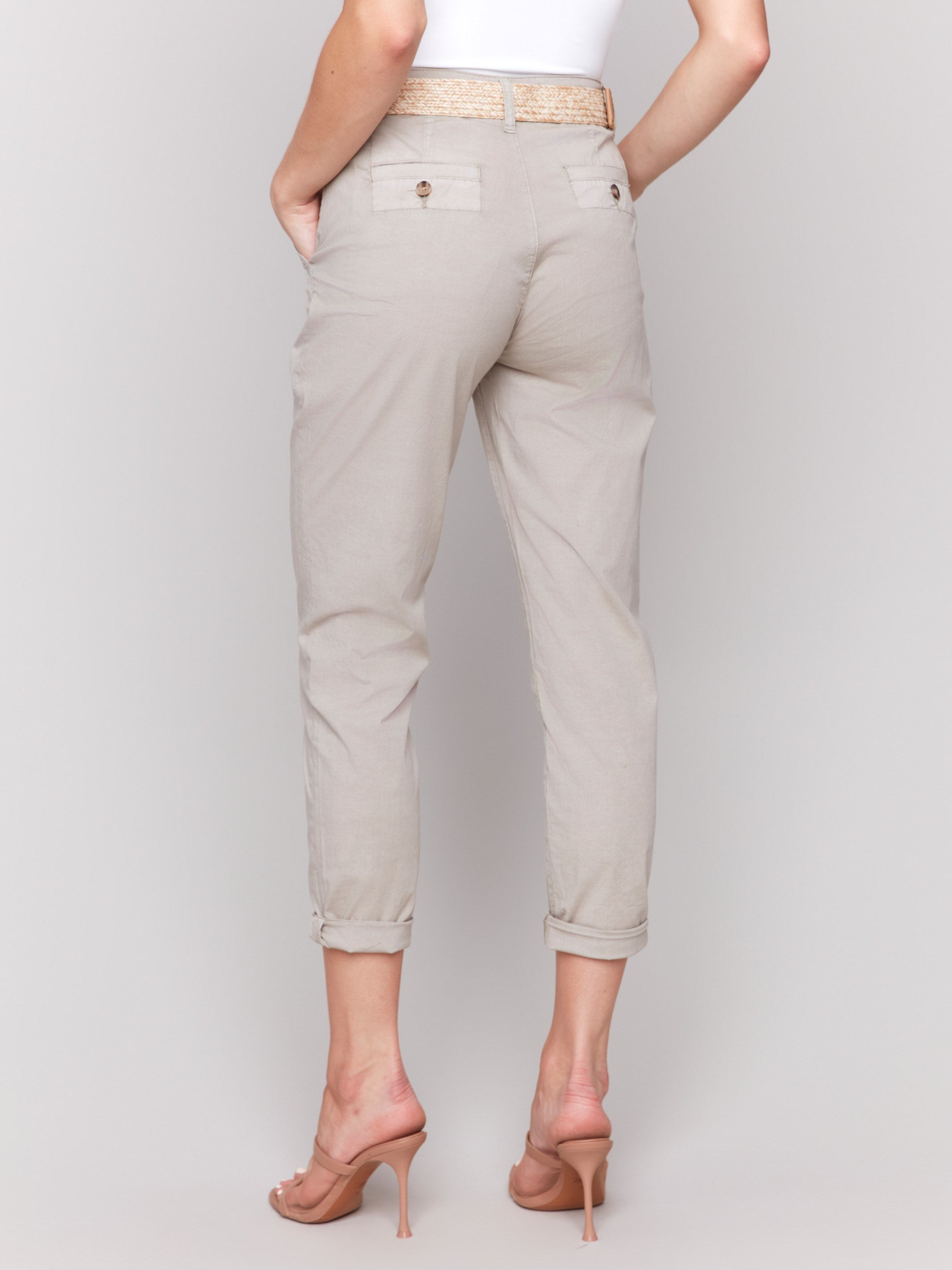 Cropped greige pants with an elegant woven belt, offering both style and comfort by Charlie B.