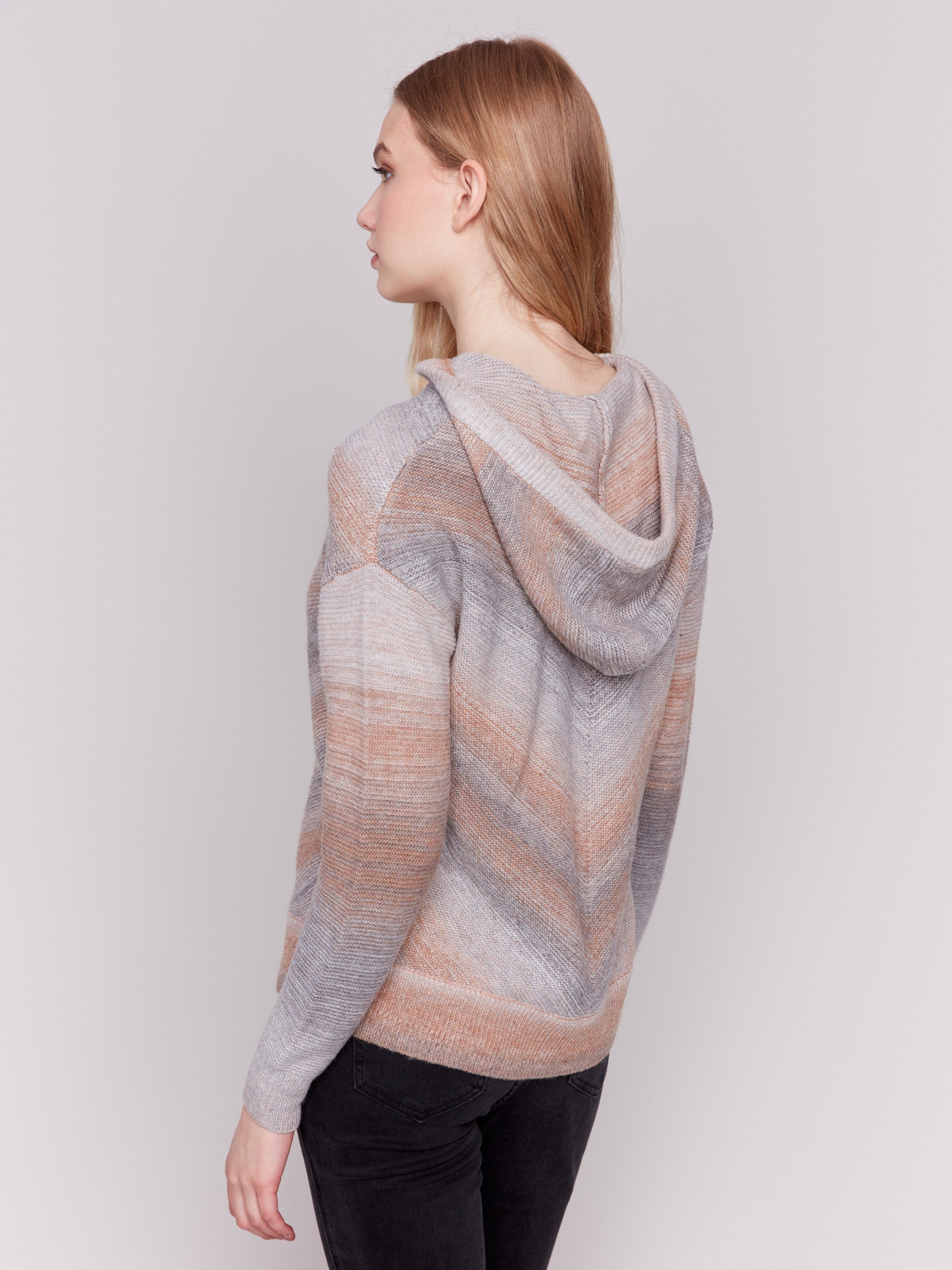 Grey and peach space dye sweater with a hood and long sleeves by Charlie B.