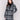 Straight-cut black & white plaid bouclé knit coat with button front closure and patch pockets by Charlie B.