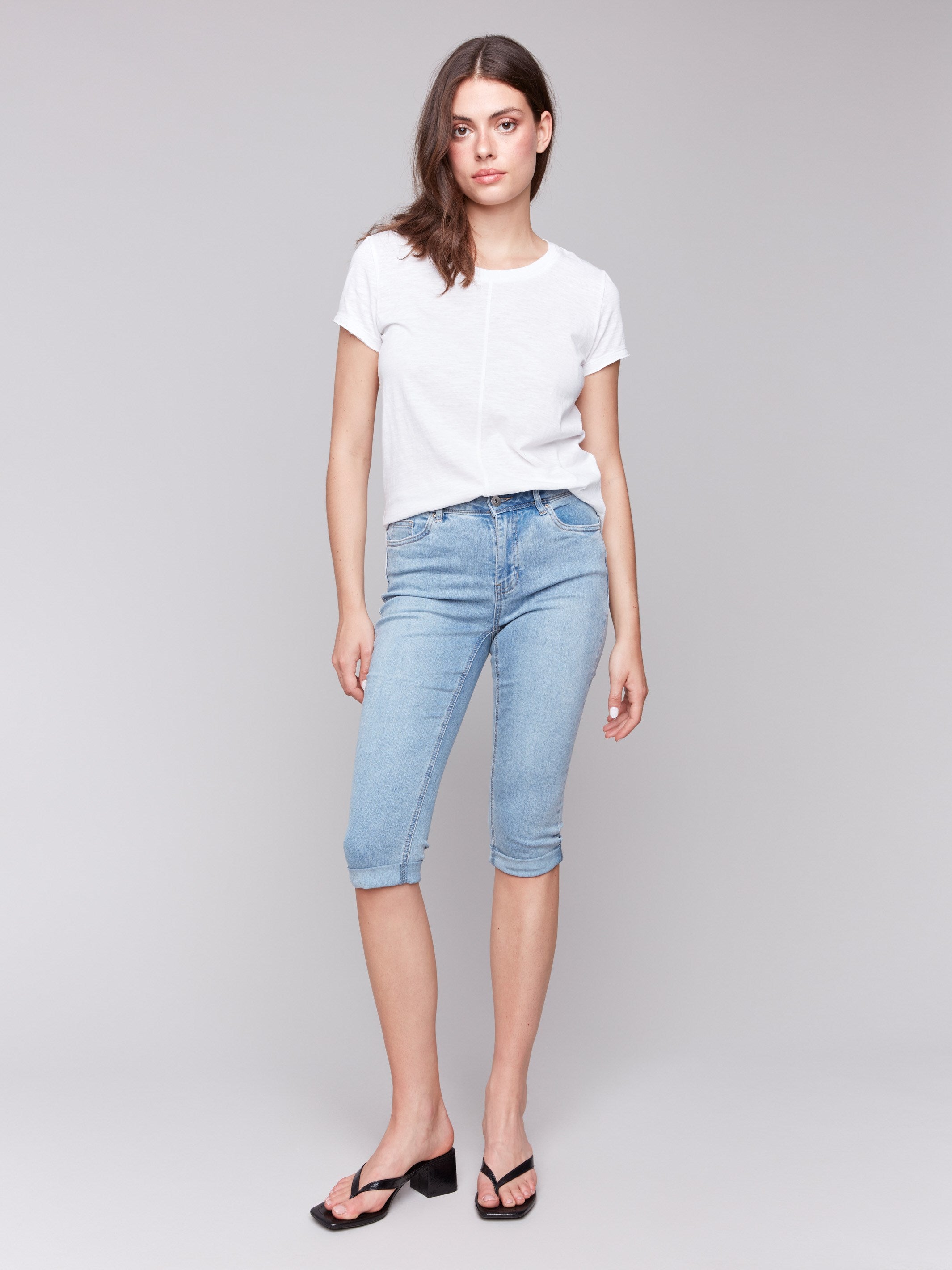 Light blue stretch denim pants with a stylish five-pocket design by Charlie B.