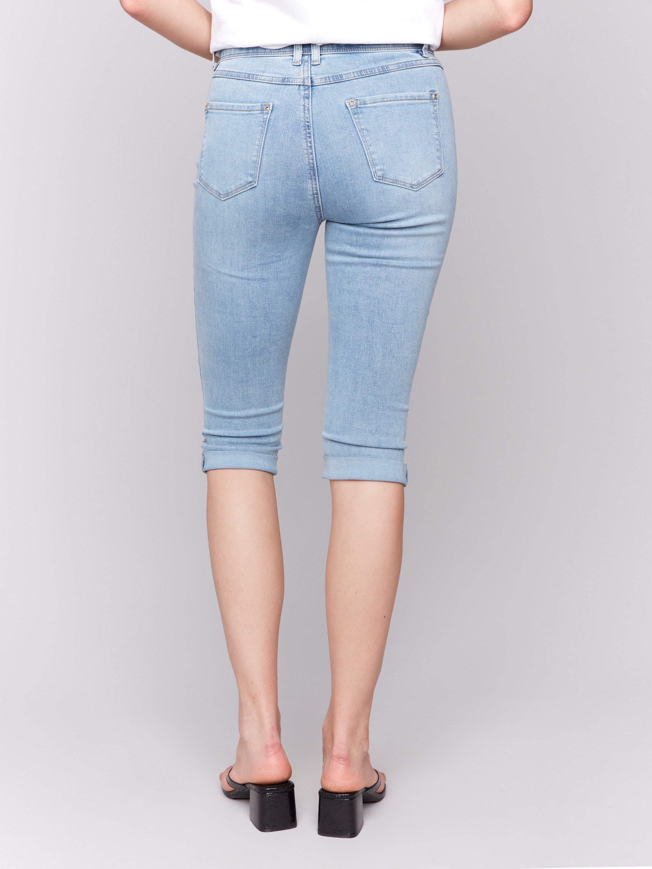 Pants with a chic folded hem and slim leg fit in light blue by Charlie B.