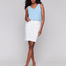 White denim skort with slim fit, ideal for stylish comfort by Charlie B.