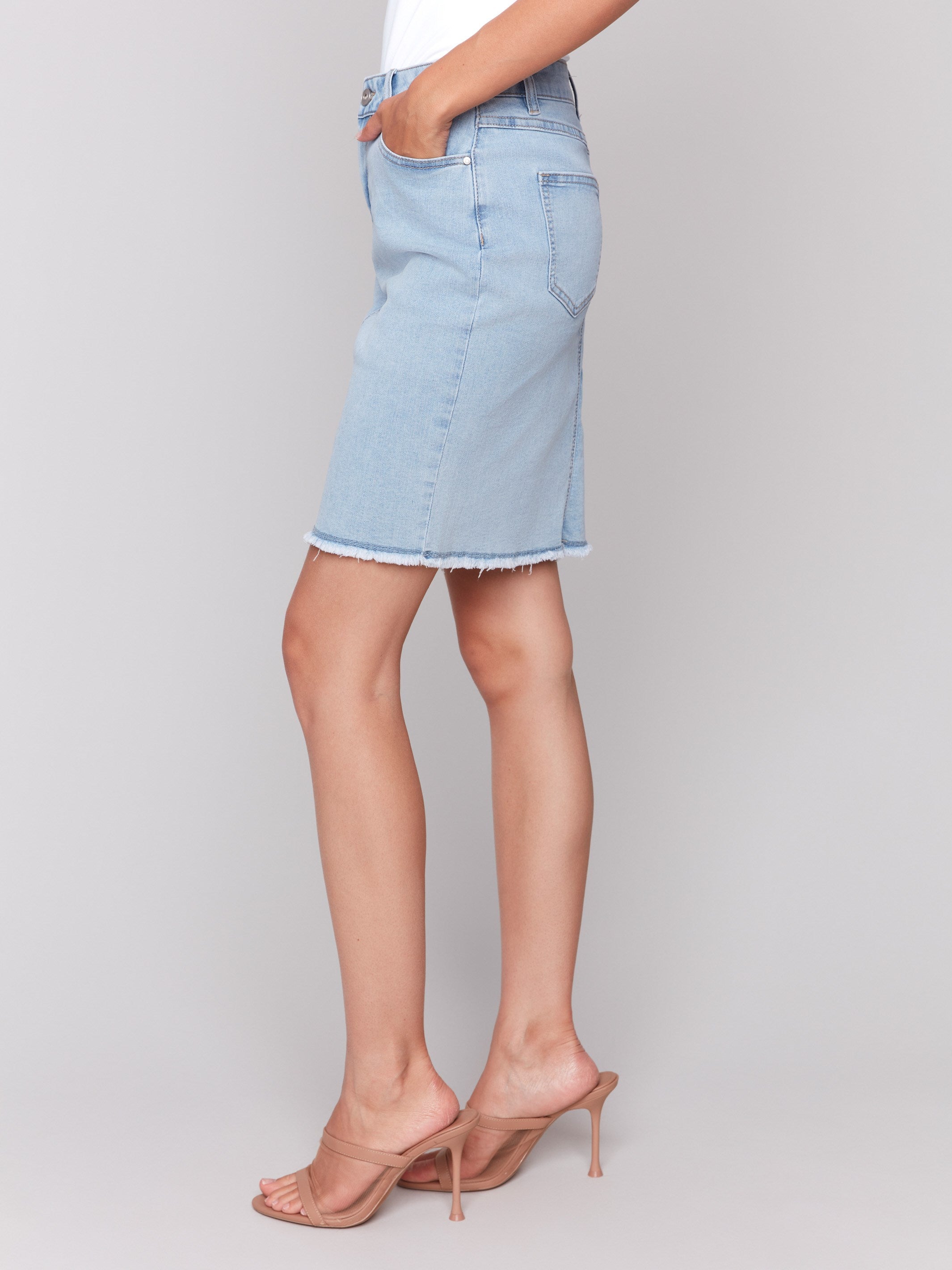 Frayed hem detail on stylish denim skort by Charlie B.