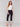 Black capri pants with a slim leg design and stretch fabric by Charlie B.