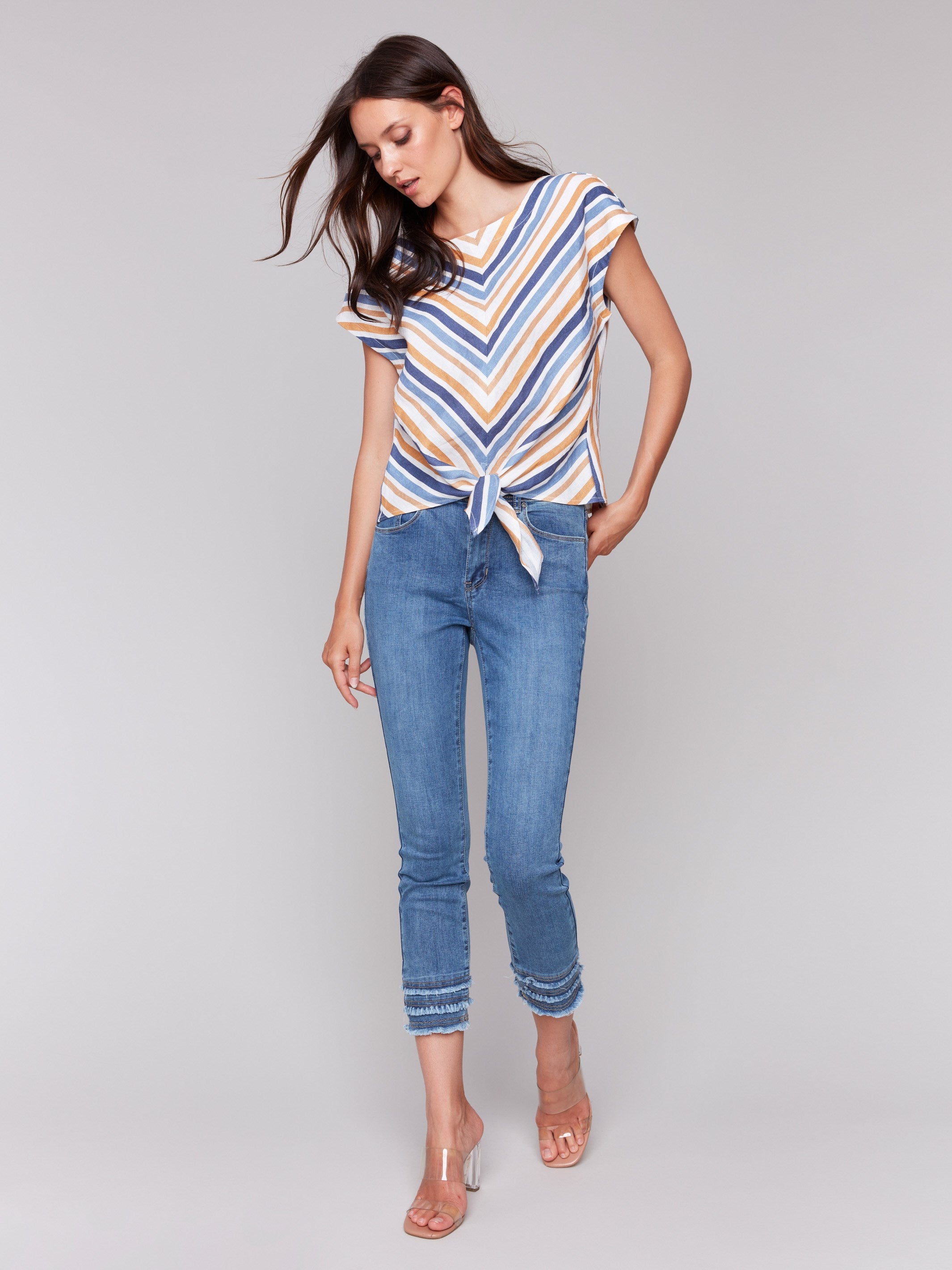 Striped pattern enhances this linen blend blouse by Charlie B.