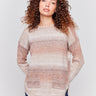 Sweater with removable scarf in a striped Timber print has a round hem and front pockets. Charlie B.