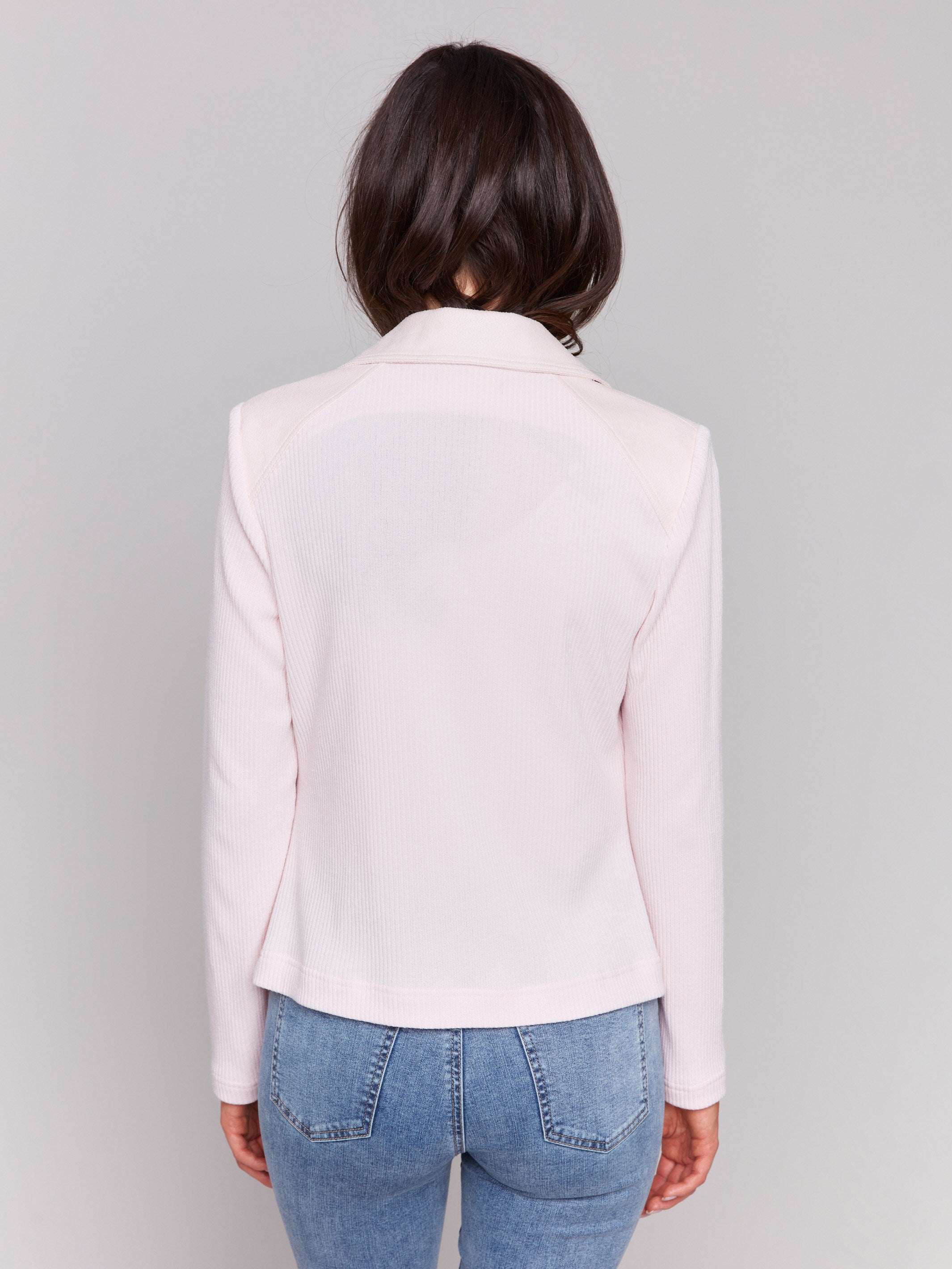 Rib knit sleeves and back on a stylish Petal jacket by Charlie B.