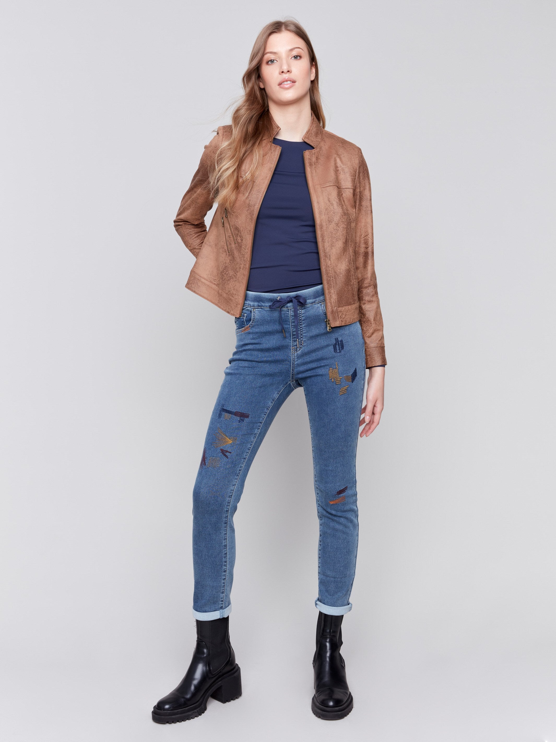 Truffle-colored faux leather jacket with front zipper and stand collar by Charlie B.