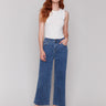 Medium blue wide-leg jeans with a raw edge hem and regular rise by Charlie B.